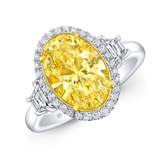 GIA Certified Fancy Yellow Oval Cut Diamond Ring with White Diamond Halo and Side Trapezoids