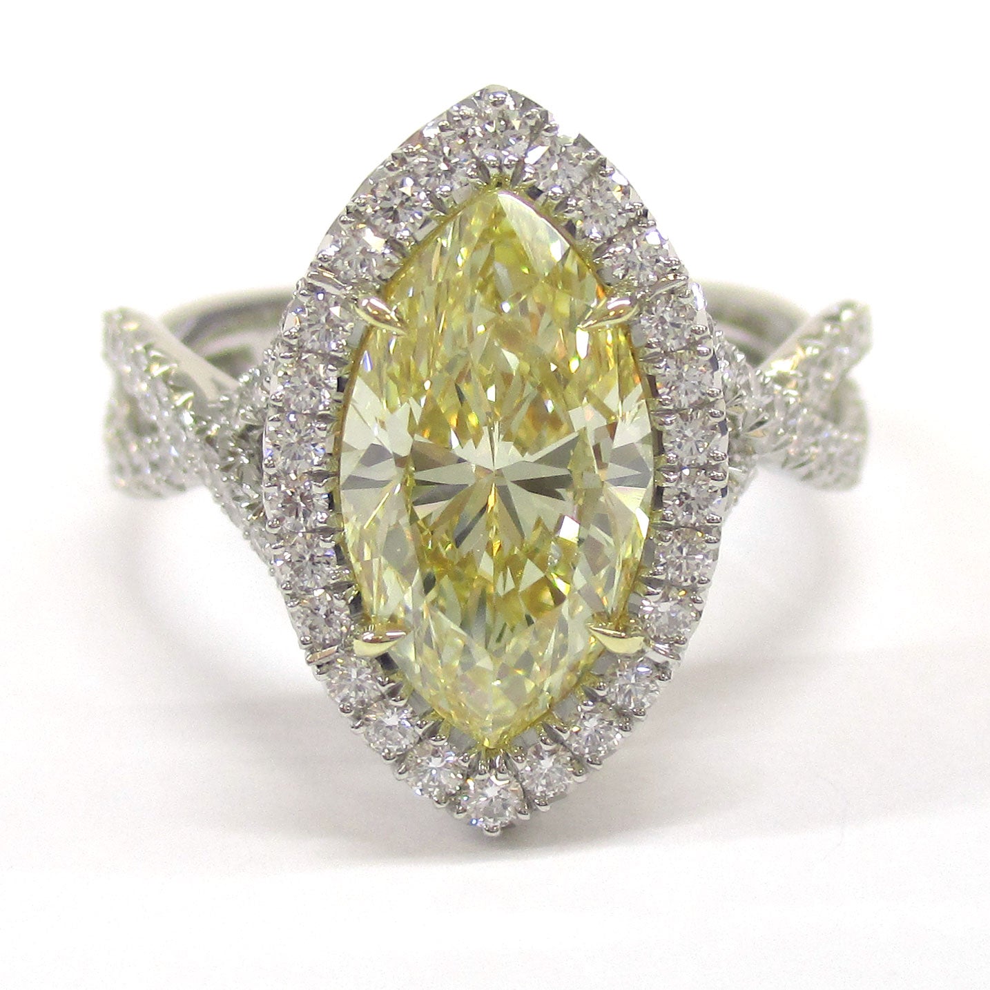 Fancy Yellow Marquise Diamond Ring with Halo and Twist Shoulders
