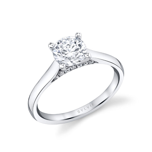 Leslie Round Cut Solitaire with Diamond Bridge Mounting
