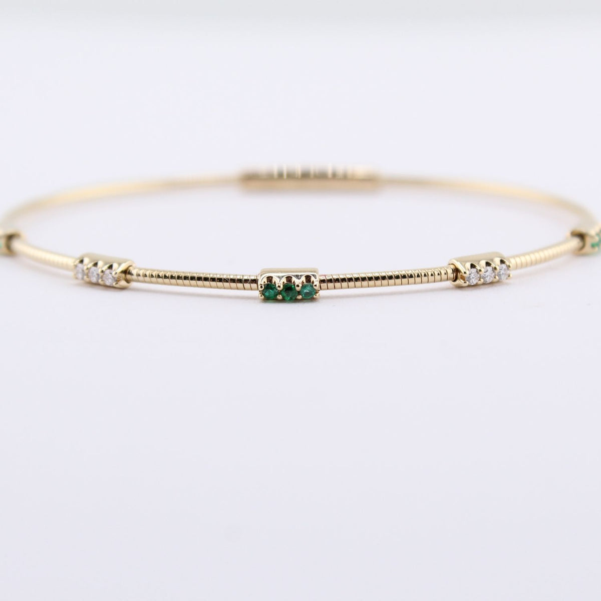 Stationary Diamond & Emerald Bar Flexible Bangle