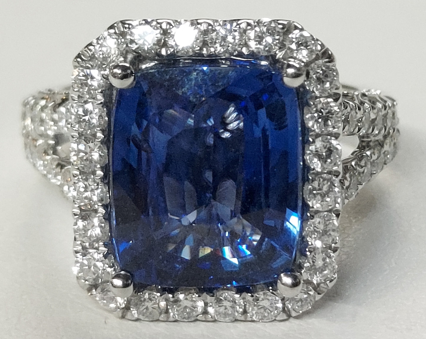 Blue Sapphire & Diamond Halo Ring