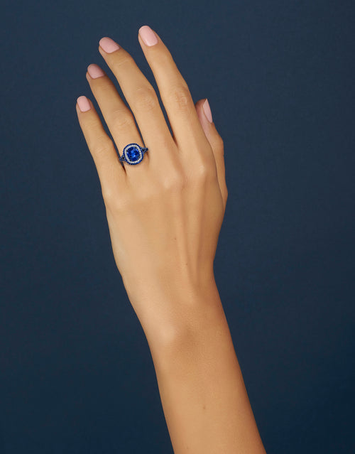 Blue Sapphire and Diamond Ring with Sapphire Halo and Shank