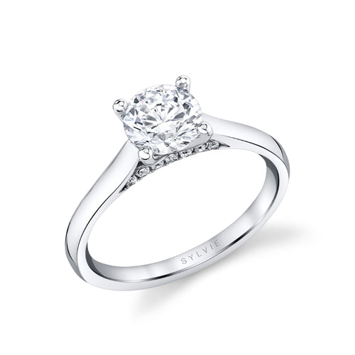 Leslie Round Cut Solitaire with Diamond Bridge Mounting