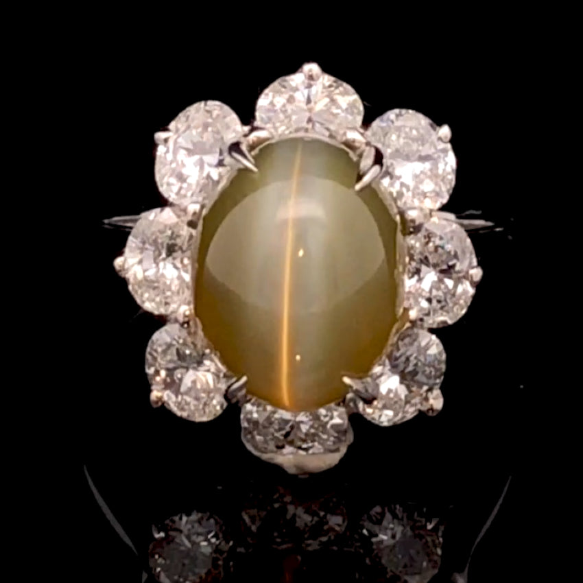 Certified Sri Lankan Cat's Eye Chrysoberyl Ring with Oval Cut Diamond Halo