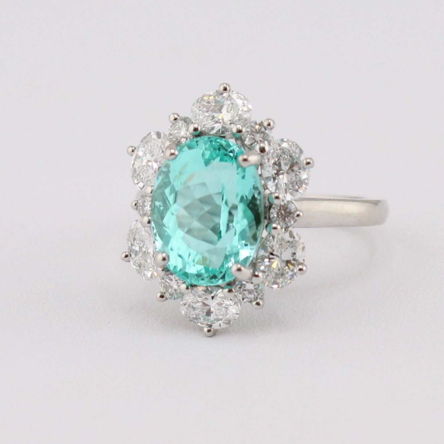 Certified Mozambique Paraiba Tourmaline Ring with Oval and Round Diamond Halo